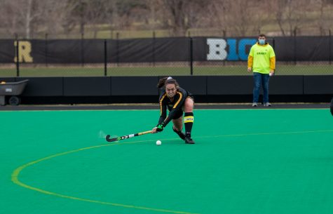 Iowa Defender Anthe Ninjziel slaps the ball to a teammate during a field hockey game between Iowa and Michigan at Grant Field on Friday, March 12, 2021. The Wolverines beat the Hawkeyes 1-0. 