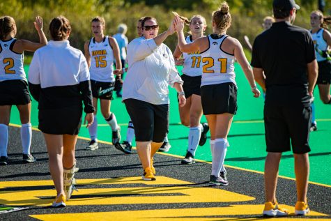 Iowa head coach Lisa Cellucci celebrates a win during a field hockey match between Iowa and California on Friday, September 13, 2019. The Hawkeyes defeated the Bears, 4-2.
