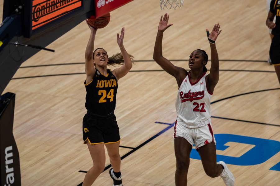 Iowa Guard Gabbie Marshall (24) takes a shot during a quarterfinal game of the Big 10 women’s basketball tournament. Iowa, ranked No. 6, took on No. 3 seeded Rutgers in Indianapolis at the Bankers Life Fieldhouse Thursday night.