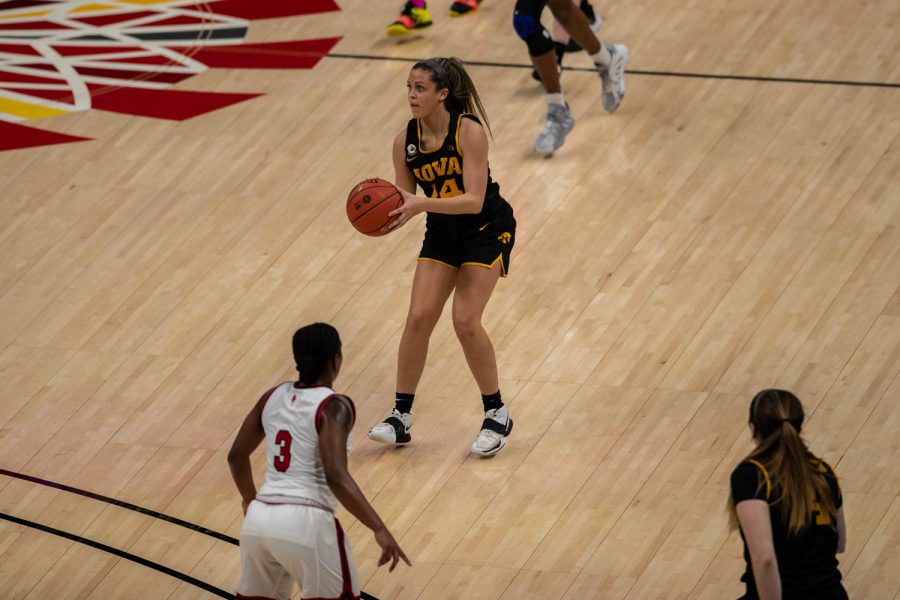 Iowa Guard Gabbie Marshall (24) takes a shot during a quarterfinal game of the Big 10 women’s basketball tournament. Iowa, ranked No. 6, took on No. 3 seeded Rutgers in Indianapolis at the Bankers Life Fieldhouse Thursday night. (Kate Heston/The Daily iowan