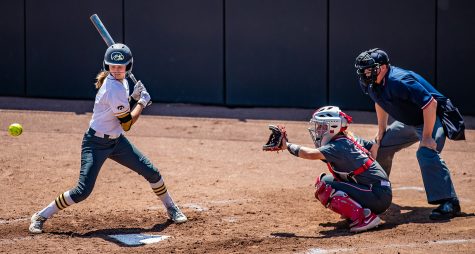 Iowa utility player Aralee Bogar watches a pitch while at-bat during a softball game between Iowa and Ohio State at Bob Pearl Field on Sunday, May 5, 2019. The Hawkeyes, celebrating senior day, fell to the Buckeyes, 5-0. 