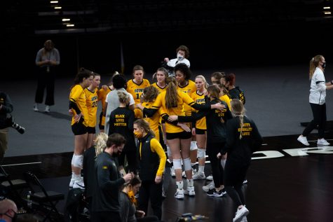 Iowa players huddle up before a womens volleyball match between Iowa and Rutgers at Xtream Arena on Saturday, Feb. 20, 2021. The Scarlet Knights defeated the Hawkeyes 3 sets to 2.