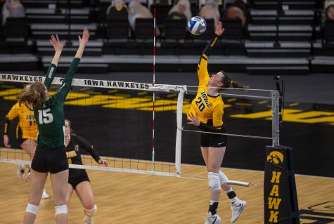 Iowa outside hitter Edina Schmidt gets a point during a volleyball match between Iowa and Michigan State at Carver-Hawkeye Arena on Saturday, March 27, 2021. The Hawkeyes defeated the Spartans 3-0. 