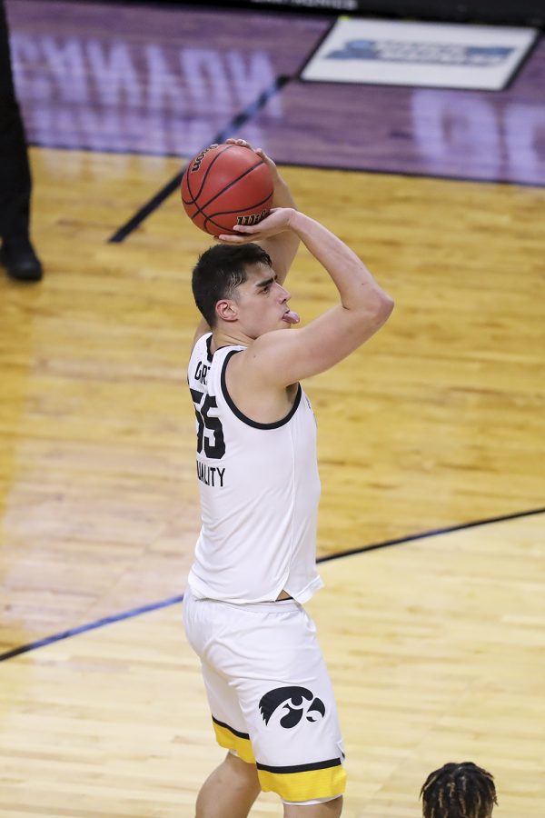 Mar 20, 2021; Indianapolis, IN, USA; Iowa Hawkeyes center Luka Garza (55) makes a jump shot against the Grand Canyon Antelopes during the first round of the 2021 NCAA Tournament at Indiana Farmers Coliseum.  