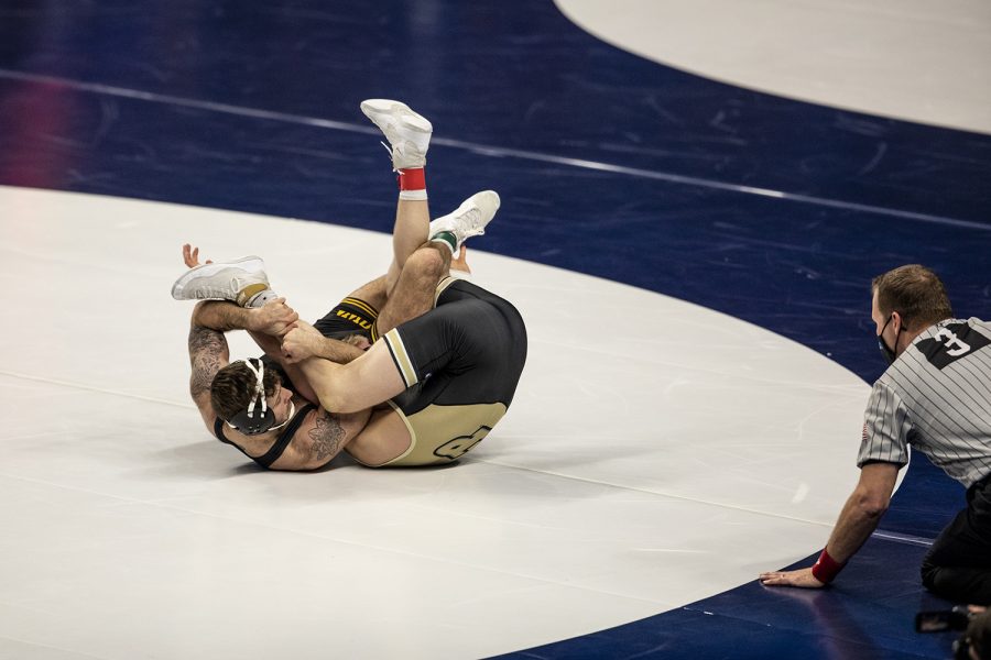 Iowa’s Jaydin Eierman attempts a fall against Purdue’s Parker Filius during the opening session of the Big Ten Wrestling Tournament at the Bryce Jordan Center in State College, PA on Saturday, March 6, 2021. Eierman won by fall in the second period. The Hawkeyes ended the first session with a team score of 75.5, putting them in first ahead of second place, Nebraska, with a score of 63. 