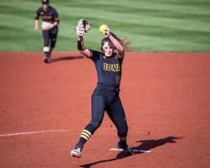 Iowa pitcher Lauren Shaw winds up to throw during a softball game between Iowa and Indiana at Pearl Field on Saturday, April 3, 2021. Shaw went six complete innings but  could not finish the seventh. The Hawkeyes defeated the Hoosiers 1-0.
