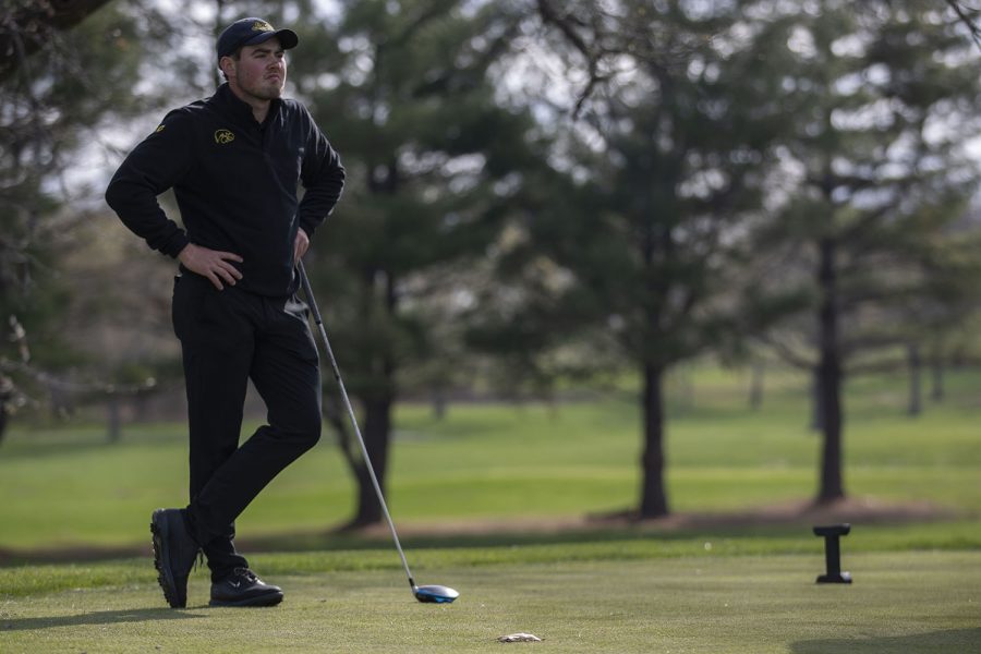 Iowas Mac McClear watches other players on the green during the mens golf Hawkeye Invitational on Saturday, April 17, 2021 at Finkbine Golf Course.