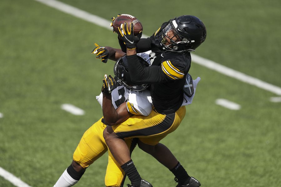 Iowa wide receiver Tyrone Tracey Jr. (3) catches a pass during Iowa football spring practice on Saturday, April 17, 2021 in Kinnick Stadium.