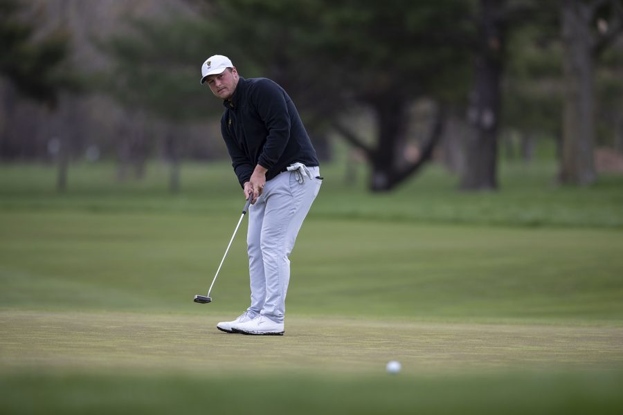 Iowa’s Alex Schaake looks to the hole during the third round of the Hawkeye Invitational at Finkbine Golf Course on Sunday, April 18, 2021. Iowa won the invitational 24 under par.