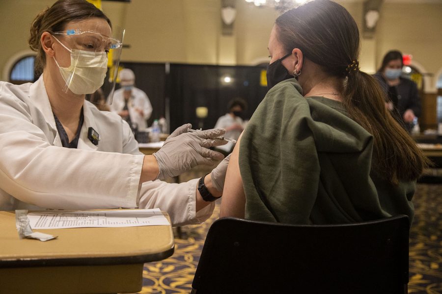 Student Kyleigh Harm receives the Pfizer COVID-19 vaccine at the Iowa Memorial Union at the University of Iowa on Wednesday, April 21, 2021.
