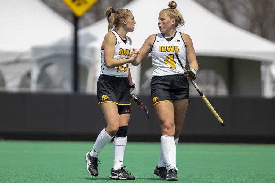 Iowa forwards Leah Zellner and Alex Wesneski walk back to midfield to prepare for a penalty corner during the first quarter of the Big Ten field hockey tournament quarterfinals against No. 4 Maryland on Wednesday, April 21, 2021 at Grant Field. The Hawkeyes defeated the Terrapins, 3-0. No. 5 Iowa will go on to play No. 1 Michigan tomorrow afternoon.