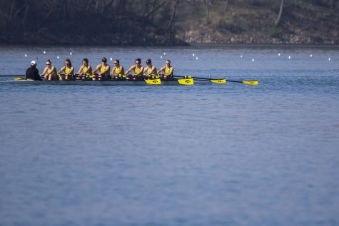 The Iowa Hawkeyes cool down while heading back to the dock after their race on Saturday, April 24, 2021.