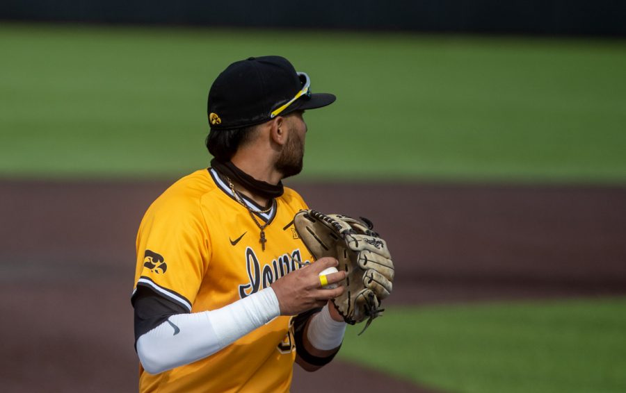 Iowa third basemen Matthew Sosa prepares to throw to first during a baseball game between Iowa and Northwestern on Sunday, April 25, 2021 at Duane Banks Field. The Hawkeyes defeated the Wildcats 15-4.