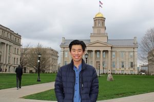 Guowei Qi, a senior studying biochemistry, math, and computer science at UI, is seen in front of the Old Capital on Thursday, April 8, 2021. Qui is one of 17 Churchill Scholars in the U.S. 