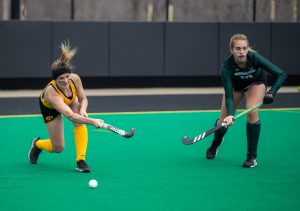 Iowa Forward Maddy Murphy sends the ball upfield during a field hockey game between Iowa and Michigan State at Grant Field on Friday, March 28, 2021. The Hawkeyes defeated the Spartans 2-0.
