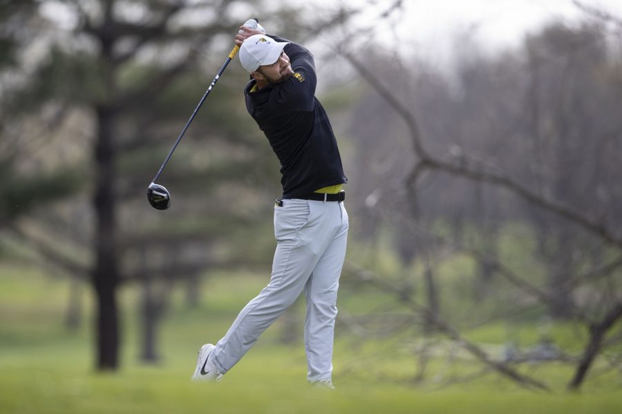 Iowa’s Gonzalo Leal Montero swings during the third round of the Hawkeye Invitational at Finkbine Golf Course on Sunday, April 18, 2021. Iowa won the invitational 24 under par.