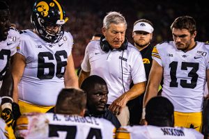 Iowa head coach Kirk Ferentz and Defensive Line Coach Kelvin Bell talk to the team during a football game between Iowa and Iowa State at Jack Trice Stadium in Ames on Saturday, September 14, 2019. The Hawkeyes retained the Cy-Hawk Trophy for the fifth consecutive year, downing the Cyclones, 18-17.