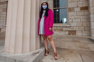 University of Iowa alum, Rebecca Chia, poses for a portrait on the Pentacrest on Sunday, April 25, 2021. Chia graduated with a degree in criminology and sociology, is the creator of the social initiative platform RealizASIANS and is the Princess of America Miss Northern States.