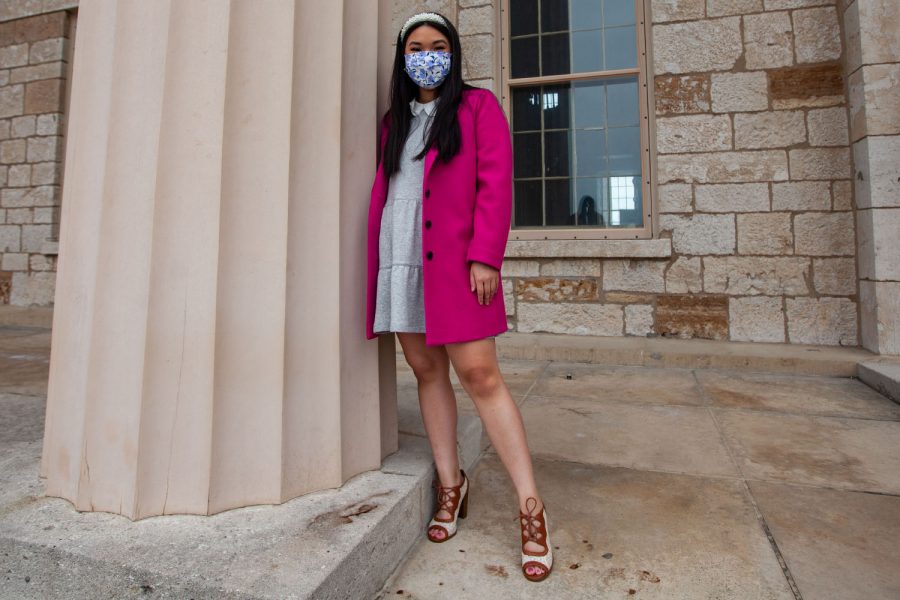 University of Iowa alum, Rebecca Chia, poses for a portrait on the Pentacrest on Sunday, April 25, 2021. Chia graduated with a degree in criminology and sociology, is the creator of the social initiative platform RealizASIANS and is the Princess of America Miss Northern States.