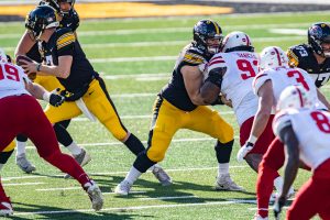Iowa center Tyler Linderbaum throws a block during a football game between Iowa and Nebraska at Kinnick Stadium on Friday, Nov. 27, 2020. The Hawkeyes defeated the Cornhuskers, 26-20.