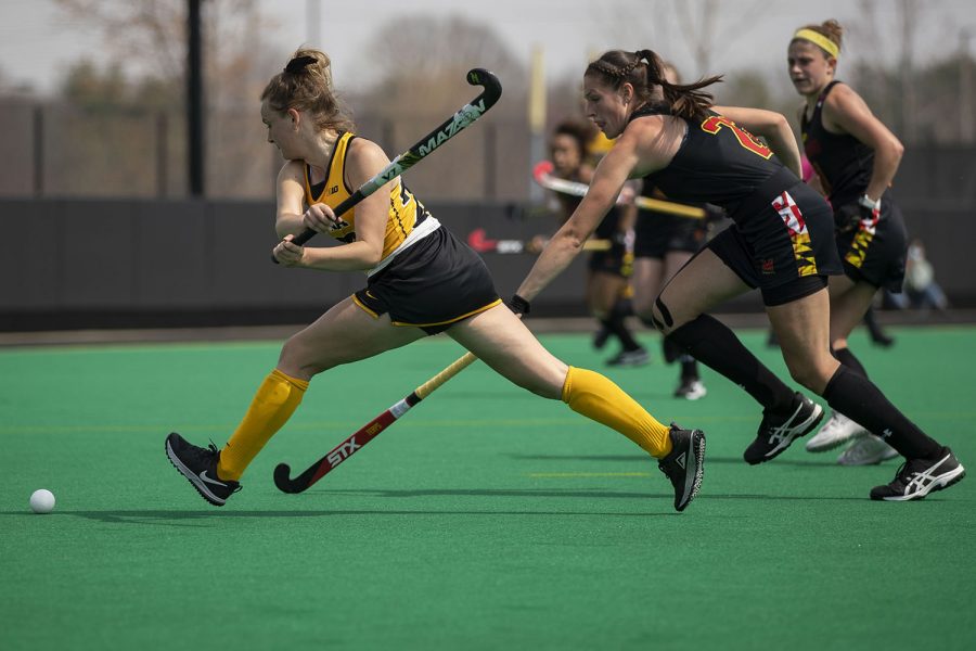 Iowa+forward+Maddy+Murphy+attempts+to+shoot+at+the+empty+goal+during+the+fourth+quarter+of+a+field+hockey+game+against+Maryland+on+Sunday%2C+April+4%2C+2021+at+Grant+Field.+The+Hawkeyes+defeated+the+Terrapins%2C+3-0.+With+12+minutes+left+of+the+game%2C+Maryland+decided+to+pull+their+goalkeeper+to+replace+the+position+with+another+player+on+offense%2C+but+switched+back+to+having+a+goalkeeper+after+10+minutes+of+game+play.