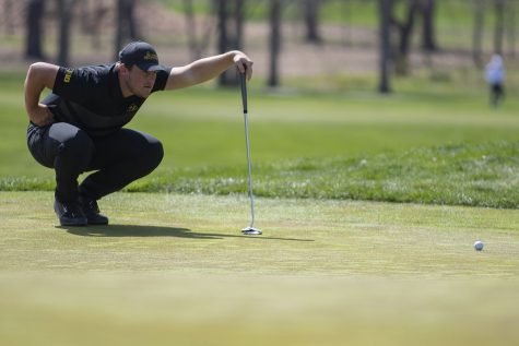 Iowas Alex Schaake lines up a shot during the mens golf Hawkeye Invitational on Saturday, April 17, 2021 at Finkbine Golf Course. 