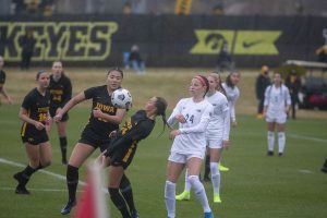 Iowa forward Meike Ingles chest bumps the ball during the Iowa women’s soccer match versus Penn State at the Iowa Soccer Complex on Thursday, March 25, 2021. The Nittany Lions defeated the Hawkeyes, 1-0. 