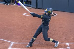 Iowa utility player Brylee Klosterman swings at a pitch during the Iowa Softball game against Northwestern on April 17, 2021 at Bob Pearl Field. Northwestern defeated Iowa 7-4. (Casey Stone/The Daily Iowan)