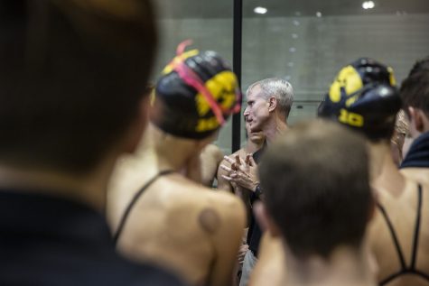 Iowa Head Coach Marc Long gives a speech to his swimmers after a swim meet at the CRWC on January 11, 2020 between Iowa, Illinois, and Notre Dame. The Hawkeye mens team defeated the fighting Irish 159.50 to 140.50 while the Hawkeye womens team defeated the fighting Illini 223 to 86 and lost to the fighting Irish 99.50 to 209.50. 