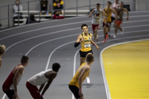 Jamal Britt finishes his leg of the 4x400m relay premier during the second day of the Larry Wieczorek Invitational on Saturday, Jan. 23, 2021 at the University of Iowa Recreation Building. Britt ran a split of 48.375, contributing to the Iowa ‘A’ team victory with a total time of 3:09.58. Due to coronavirus restrictions, the Hawkeyes could only host Big Ten teams. Iowa men took first, scoring 189, and women finished third with 104 among Minnesota, Wisconsin, Nebraska, and Illinois. 