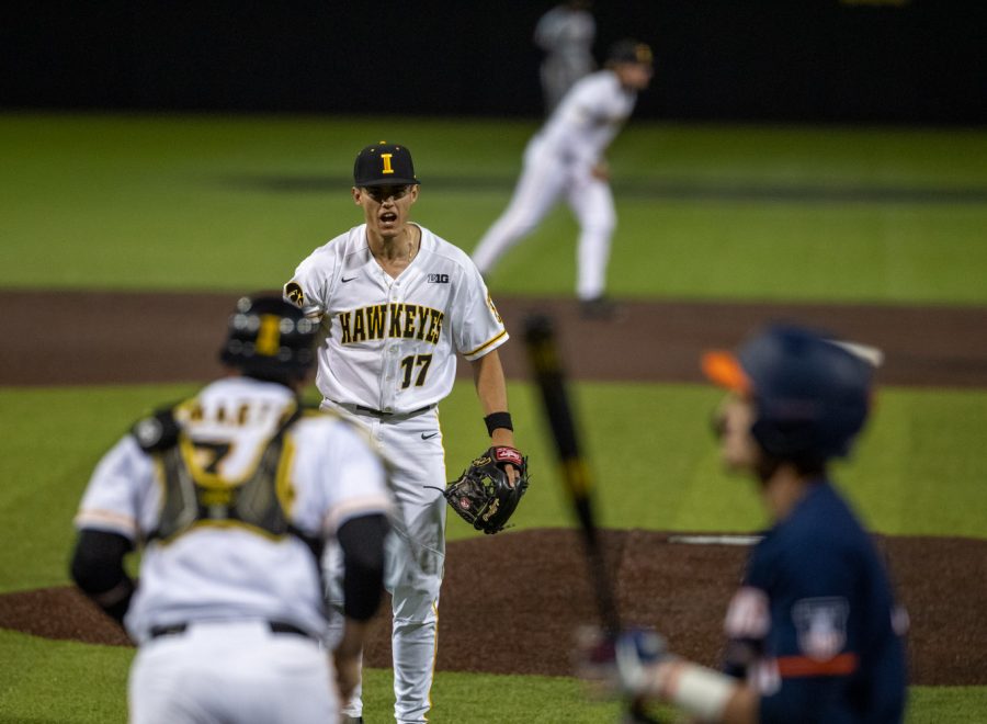 Iowa pitcher Dylan Nedved celebrates a strike out and the win during a baseball game between Iowa and Illinois on Friday, May 14, 2021 at Duane Banks Field. The Hawkeyes defeated the Fighting Illini 5-4.
