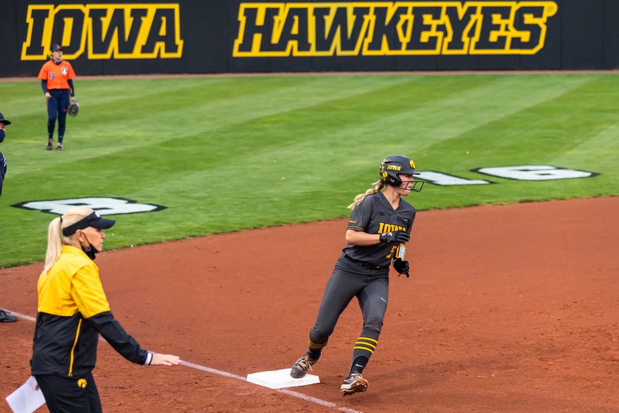 Iowa utility player Denali Loecker runs to third base during the Iowa Softball game against Illinois on May 14, 2021 at Bob Pearl Field. Iowa defeated Illinois 3-1. 