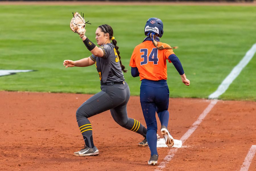 Iowa infielder Kalena Burns catches the ball for an out during the Iowa Softball game against Illinois on May 14, 2021 at Bob Pearl Field. Iowa defeated Illinois 3-1. 