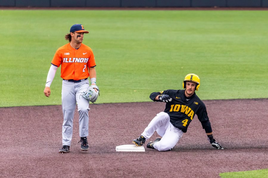 Iowa infielder/outfielder Brayden Frazier slides into second base during the Iowa Baseball game against Illinois on May 15, 2021 at Duane Banks Field. Illinois defeated Iowa 14-1. 