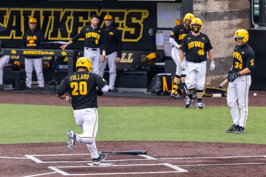 Iowa infielder Izaya Fullard scores Iowa’s run during the Iowa Baseball game against Illinois on May 15, 2021 at Duane Banks Field. Illinois defeated Iowa 14-1. 