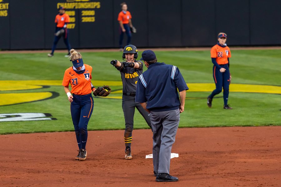 Iowa infielder Aralee Bogar celebrates getting to second base during the Iowa Softball game against Illinois on May 14, 2021 at Bob Pearl Field. Iowa defeated Illinois 3-1. 