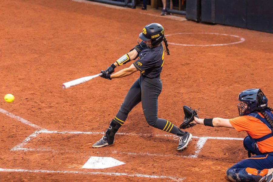 Iowa utility player Brylee Klosterman hits the ball during the Iowa Softball game against Illinois on May 14, 2021 at Bob Pearl Field. Iowa defeated Illinois 3-1. 