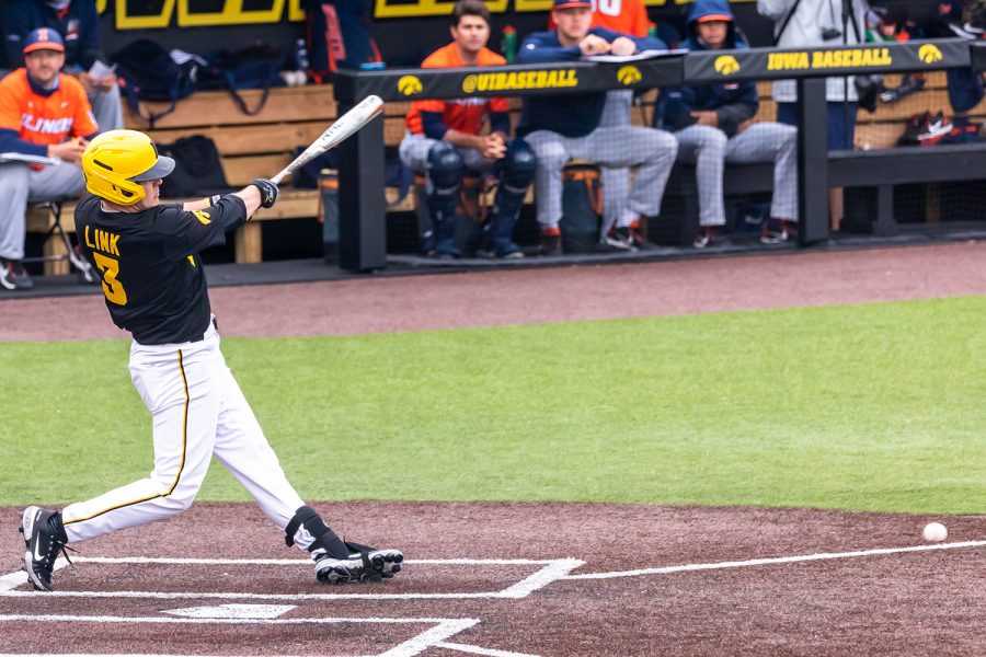 Iowa utility player Sam Link hits the ball during the Iowa Baseball game against Illinois on May 15, 2021 at Duane Banks Field. Illinois defeated Iowa 14-1. 