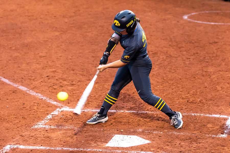 Iowa outfielder Riley Sheehy hits the ball during the Iowa Softball game against Illinois on May 14, 2021 at Bob Pearl Field. Iowa defeated Illinois 3-1. 