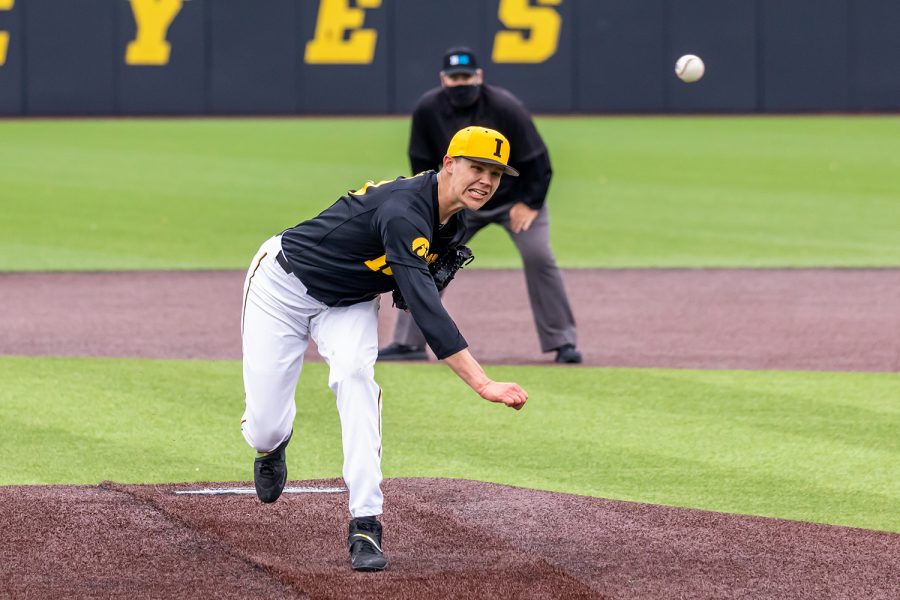 Iowa right-hand pitcher Jack Guzek pitches the ball during the Iowa Baseball game against Illinois on May 15, 2021 at Duane Banks Field. Illinois defeated Iowa 14-1. 