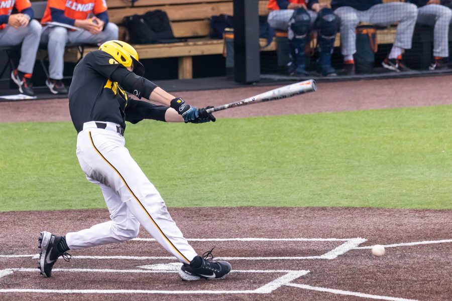 Iowa outfielder Ben Norman hits the ball during the Iowa Baseball game against Illinois on May 15, 2021 at Duane Banks Field. Illinois defeated Iowa 14-1. 