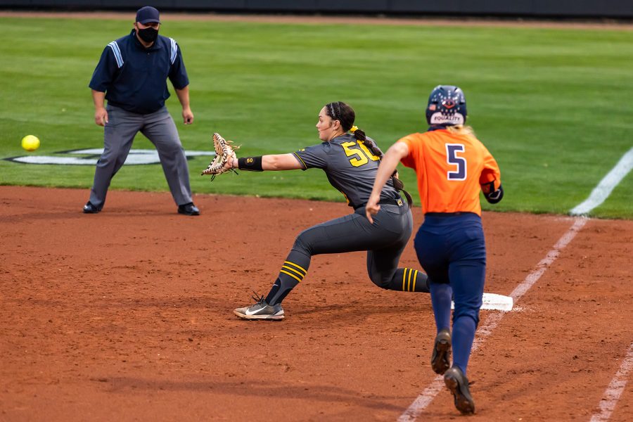 Iowa infielder Kalena Burns catches the ball for an out during the Iowa Softball game against Illinois on May 14, 2021 at Bob Pearl Field. Iowa defeated Illinois 3-1. 