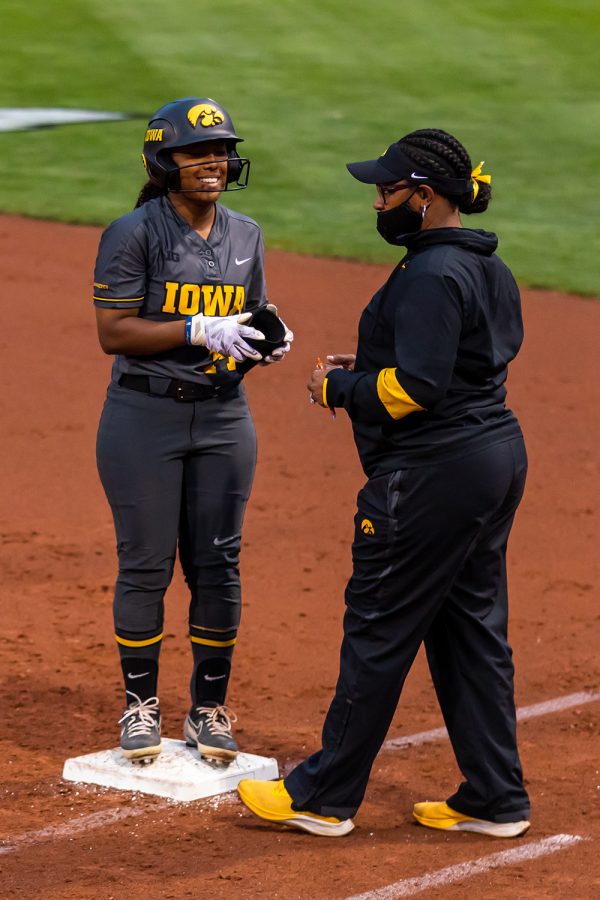 Iowa outfielder Nia Carter celebrates getting on base during the Iowa Softball game against Illinois on May 14, 2021 at Bob Pearl Field. Iowa defeated Illinois 3-1. 