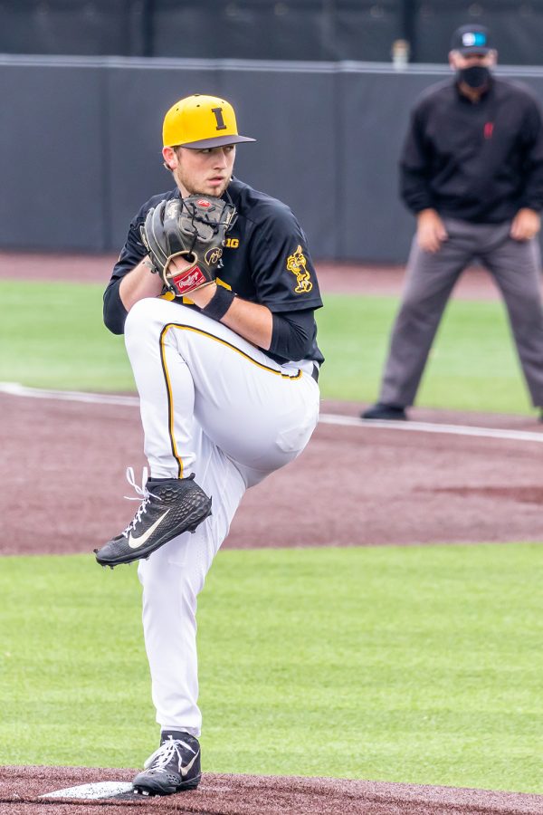 Iowa right-hand pitcher Duncan Davitt prepares to pitch the ball during the Iowa Baseball game against Illinois on May 15, 2021 at Duane Banks Field. Illinois defeated Iowa 14-1. 