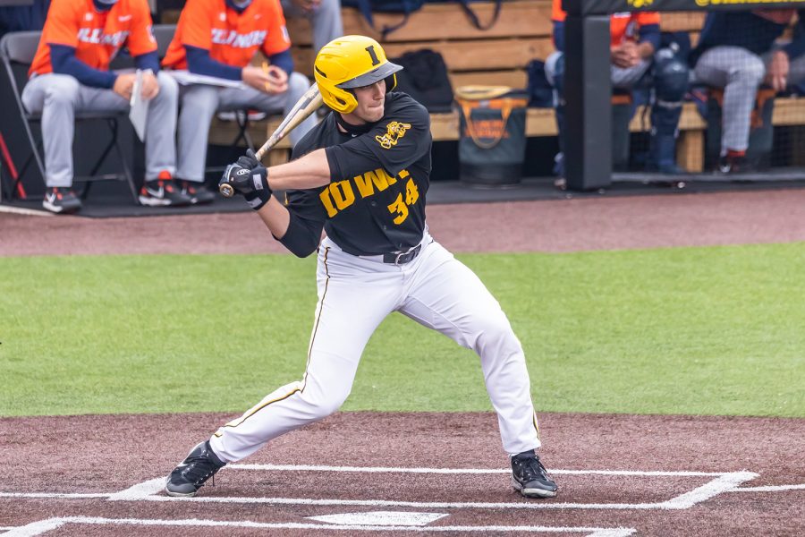 Iowa catcher Austin Martin goes to swing at the ball during the Iowa Baseball game against Illinois on May 15, 2021 at Duane Banks Field. Illinois defeated Iowa 14-1. 