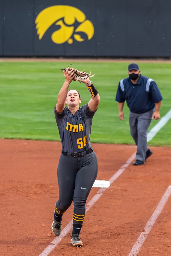 Iowa infielder Kalena Burns catches the ball during the Iowa Softball game against Illinois on May 14, 2021 at Bob Pearl Field. Iowa defeated Illinois 3-1. 