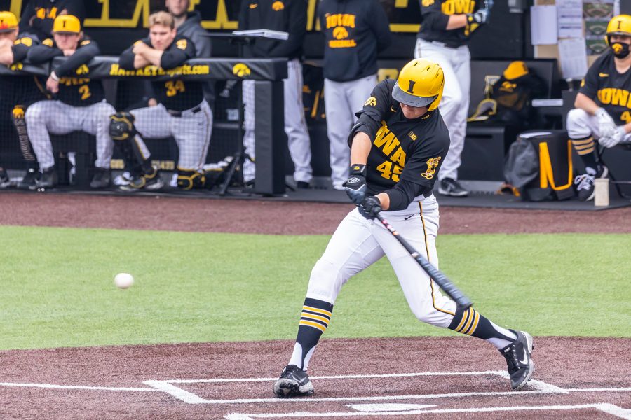 Iowa first baseman Peyton Williams swings at the ball during the Iowa Baseball game against Illinois on May 15, 2021 at Duane Banks Field. Illinois defeated Iowa 14-1. 