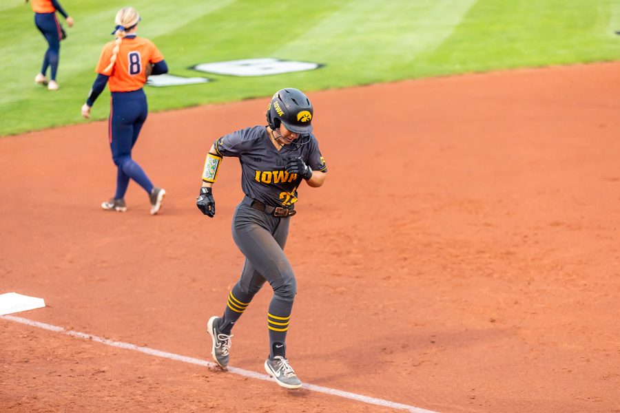 Iowa utility player Brylee Klosterman runs to home base during the Iowa Softball game against Illinois on May 14, 2021 at Bob Pearl Field. Iowa defeated Illinois 3-1. 