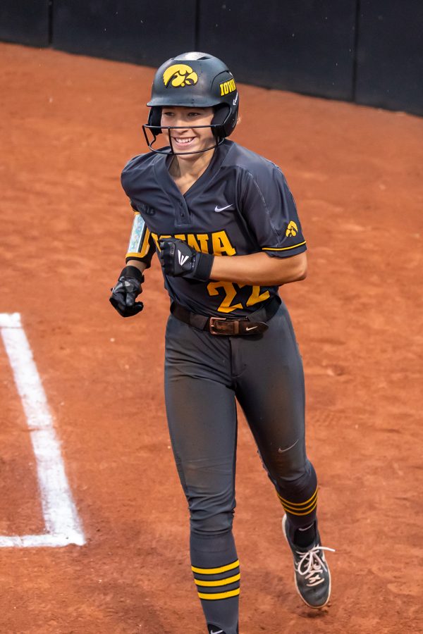 Iowa utility player Brylee Klosterman celebrates scoring a run during the Iowa Softball game against Illinois on May 14, 2021 at Bob Pearl Field. Iowa defeated Illinois 3-1. 