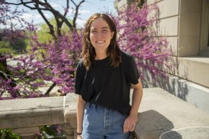 University of Iowa senior and Co-President of the University Environmental Coalition, Emily Manders, poses for a portrait on the Pentacrest on Sunday, May 2, 2021.